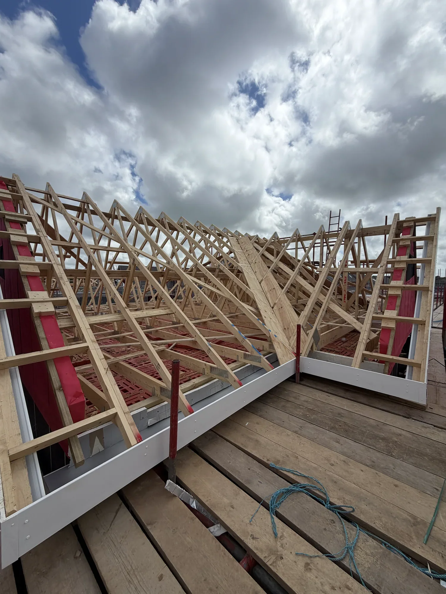 Timber roof trusses installed on a new-build structure